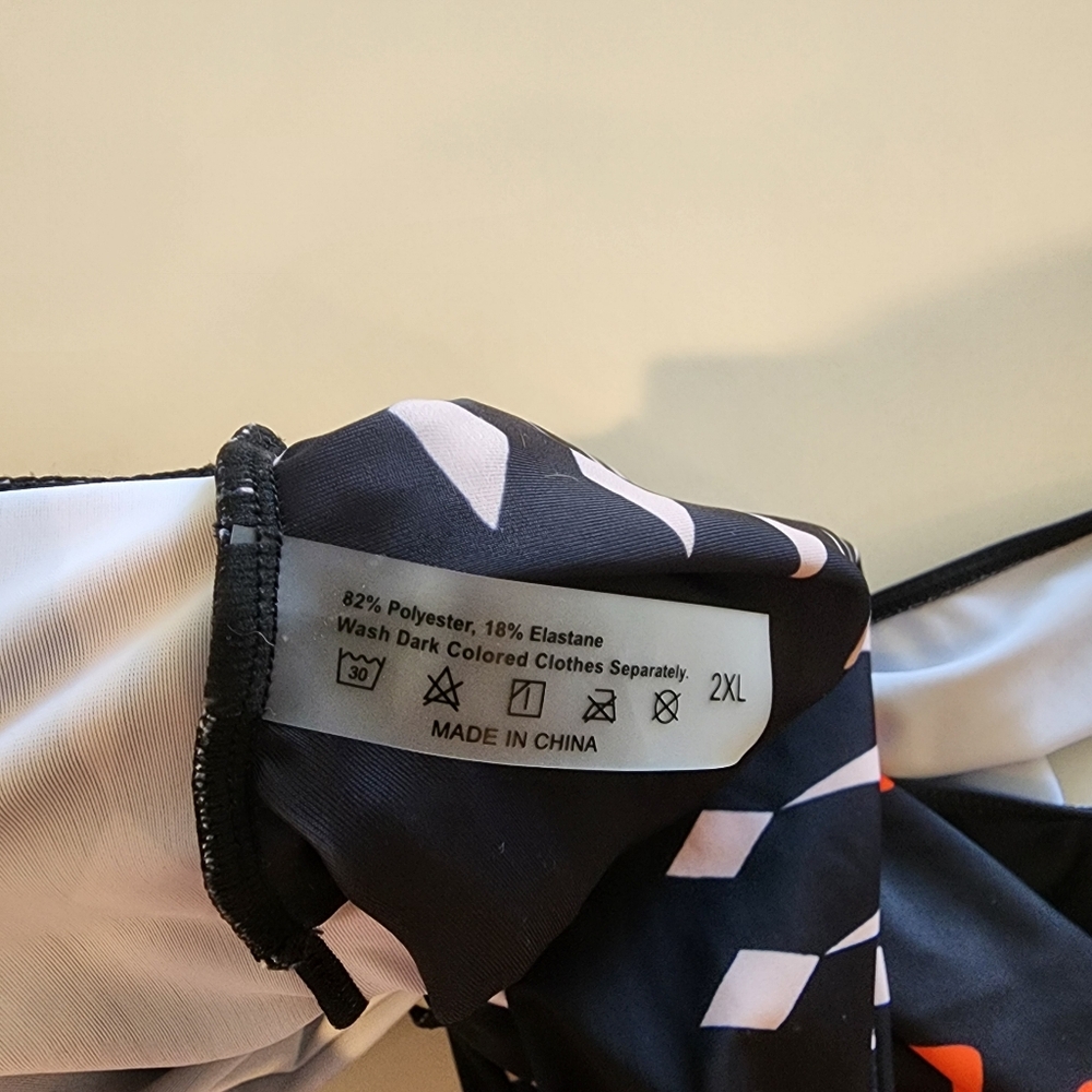 Cutout Twist Front Black and Orange Swimsuit - Picture 6 of 7